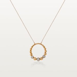 img src="collier.jpg" alt="collier en or rose avec pendentif cercle serti de diamants et sphères polies"