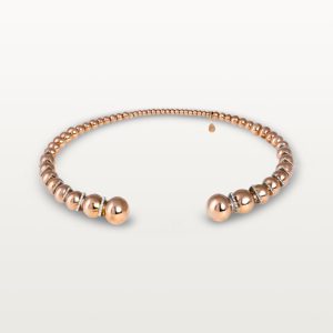 img src="collier.jpg" alt="collier choker en or rose avec sphères polies et diamants design moderne"