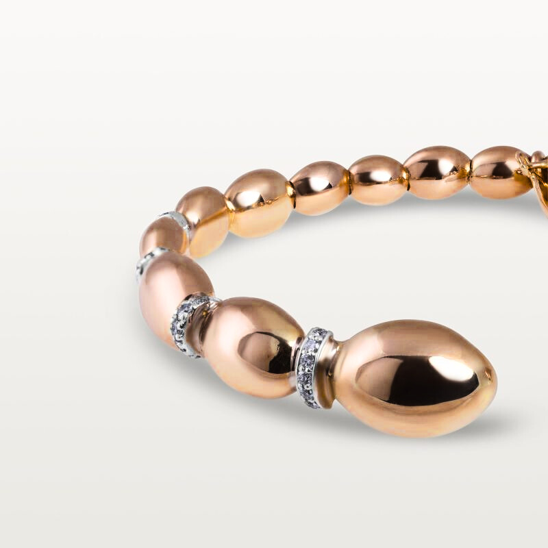 img src="collier.jpg" alt="collier choker en or rose avec perles ovales polies design minimaliste"