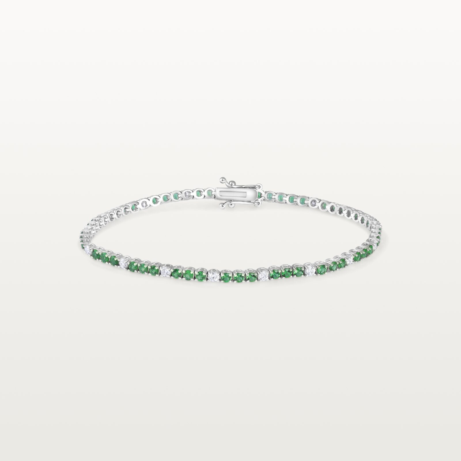 BRACELET TENNIS LES KLASSIQUES, ÉMERAUDES ET DIAMANTS BLANCS ALTERNÉS